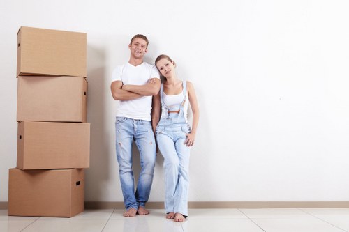 Man With Van Queens Park pricing overview with moving van and packed boxes