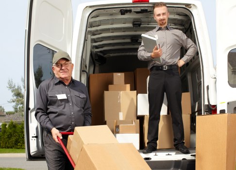 Residential furniture moving through a Queens Park flat staircase