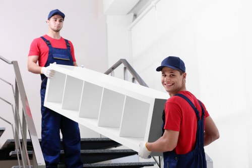 Moving boxes and furniture with a local van service in Queens Park