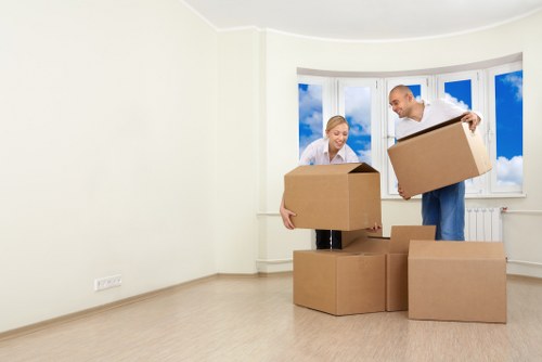 Local removals van serving a Queens Park flat move