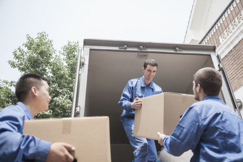 Commercial moving truck service near Queens Park properties