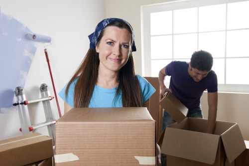 Professional van moving team following health and safety practices