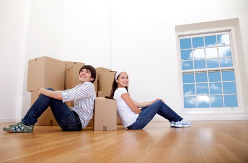 Preparing and packing belongings for storage in Queens Park