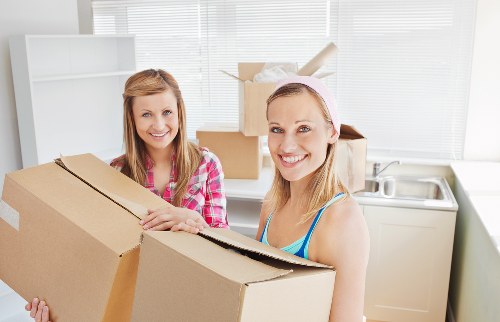 Moving checklist and packing supplies prepared for a Queens Park move